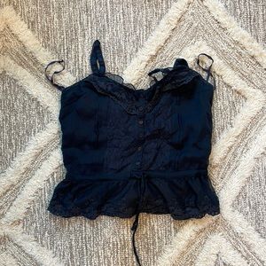 Rue 21 navy blue top with adjustable straps, never worn, size small